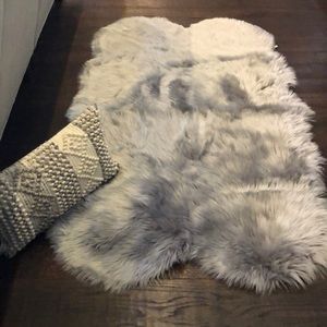 Large gray faux fur rug